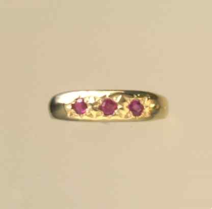 GPC 3 STONE RUBY GYPSY RING            =