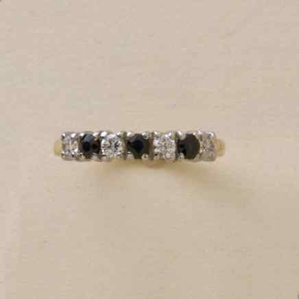 GPC CZ/SAPPHIRE 7 STONE ETERNITY RING  =