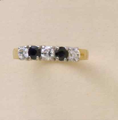 GPC CZ/SAPPHIRE 5 ST ETERNITY RING     =