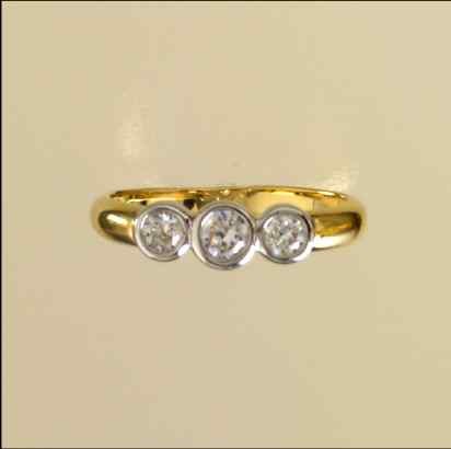 GPC CZ 3 STONE RUB OVER SET RING       =