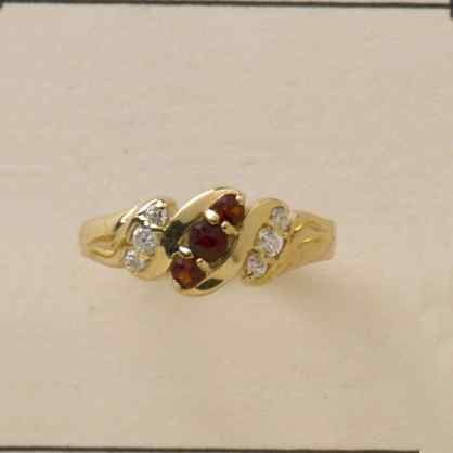 GPC CZ/GARNET FANCY RING               =