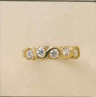 GPC CZ 5 STONE WIGGLY ETERNITY RING    =