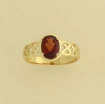 GPC OVAL GARNET CELTIC RING            =