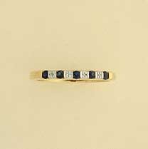 9ct 2mm WIDE SAPH/DIAMOND 1/2 ET RING  =