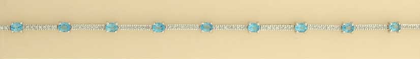 9ct WHITE 45pt DIA/BLUE TOPAZ BRAC