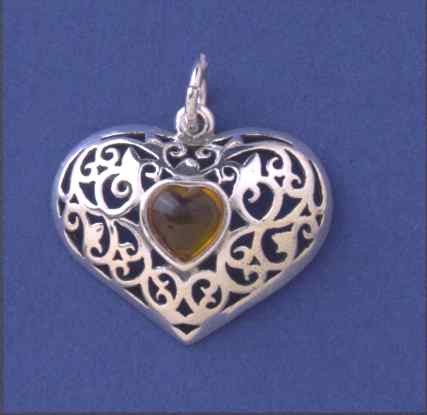 SPC AMBER IN CUTOUT HEART PENDANT      =