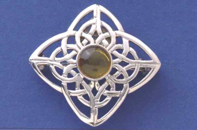 SPC CELTIC AMBER BROOCH                =