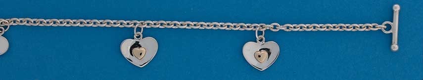 SIL/9ct TRACE CHAIN BRAC/HANGING HEARTS