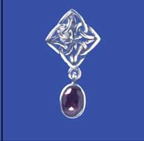 SPC OVAL GARNET CUTOUT CELTIC PENDANT