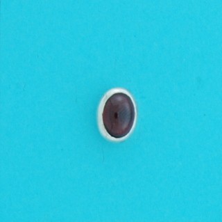 SPC 7x5mm OVAL GARNET RUBSET STUDS     =