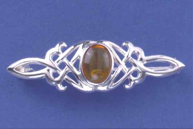 SPC 10x8 OVAL AMBER CAST CELTIC BROOCH =