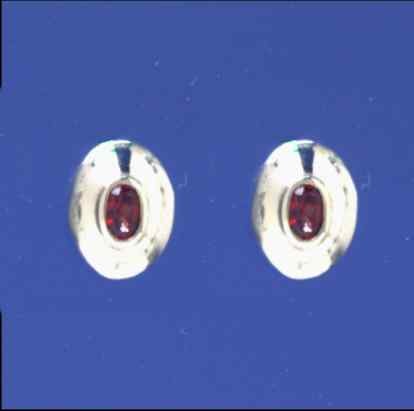 SPC OVAL GARNET SET 11x9 DOMED STUDS   =