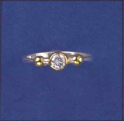 SPC 4mm CZ PLATED BEZEL/BEADS RING     -