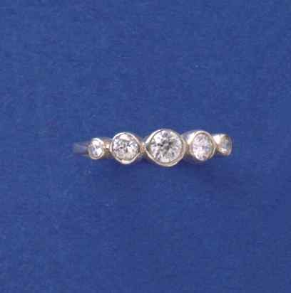 SPC GRADUATED 5 STONE CZ RUB SET RING  =