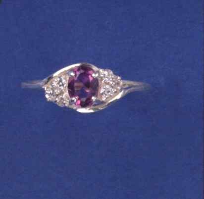 SPC IMM AME/CZ FANCY CLUSTER X-OVER RING