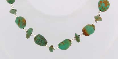 SPC TUMBLE POLISHED TURQ BEADS CHAIN   =