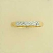 9ct 25pt DIAMOND 7 STONE RUBSET RING