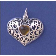 SPC AMBER IN CUTOUT HEART PENDANT      =