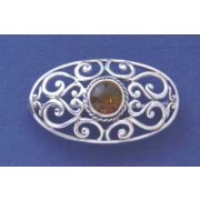 SPC AMBER OVAL CUTOUT BROOCH           =