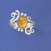 SPC 8x6 OVAL AMBER FANCY RING