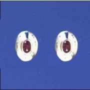 SPC OVAL GARNET SET 11x9 DOMED STUDS   =