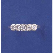 SPC 5 STONE CZ RUBSET 1/2 ET RING