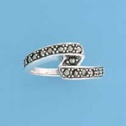 SPC MARCASITE SET CROSSOVER RING       =