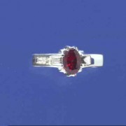 SPC 7x5mm OVAL GARNET CLAW SET RING