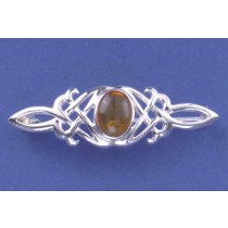 SPC 10x8 OVAL AMBER CAST CELTIC BROOCH =