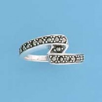 SPC MARCASITE SET CROSSOVER RING       =