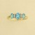 9ct BLUE TOPAZ/3pt DIA SET RING        =