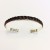 SPC PLAITED LEATHER SILVER TORQUE-BROWN
