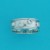 SPC 4 CZ STONES ON 7mm BAND            -
